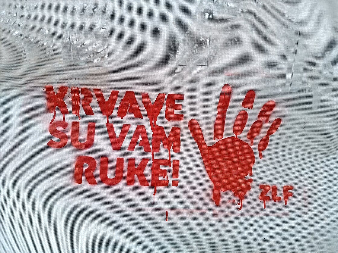 1200px-Krvave_su_vam_ruke
